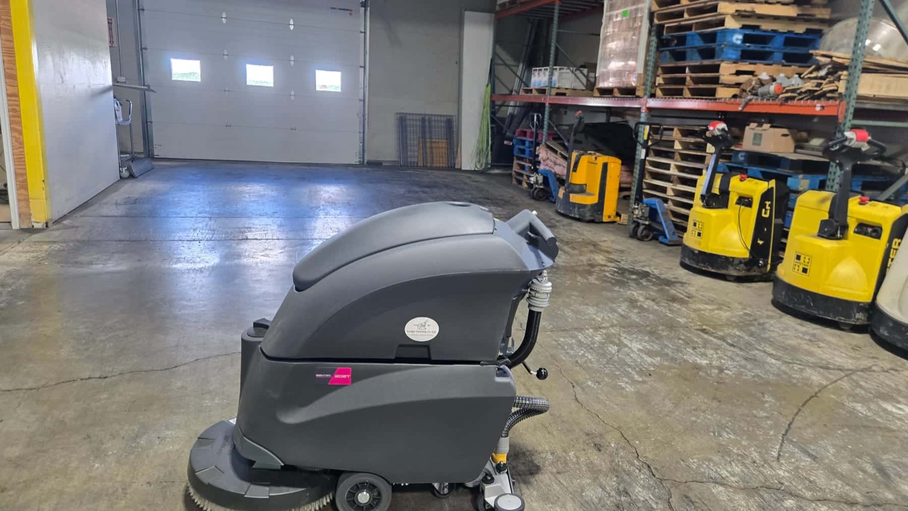 Floor scrubbing in a commercial warehouse