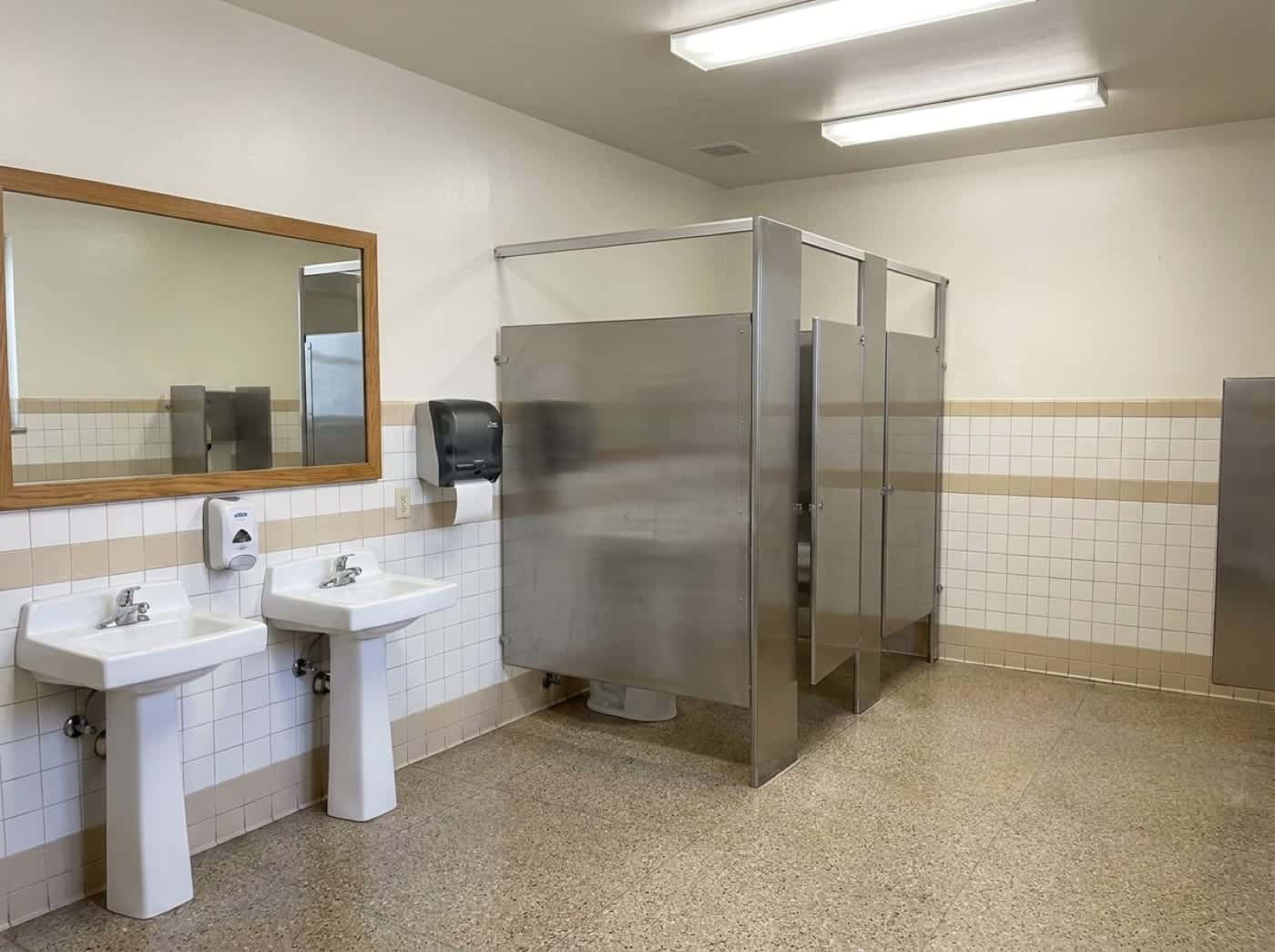 A clean, freshly serviced public restroom